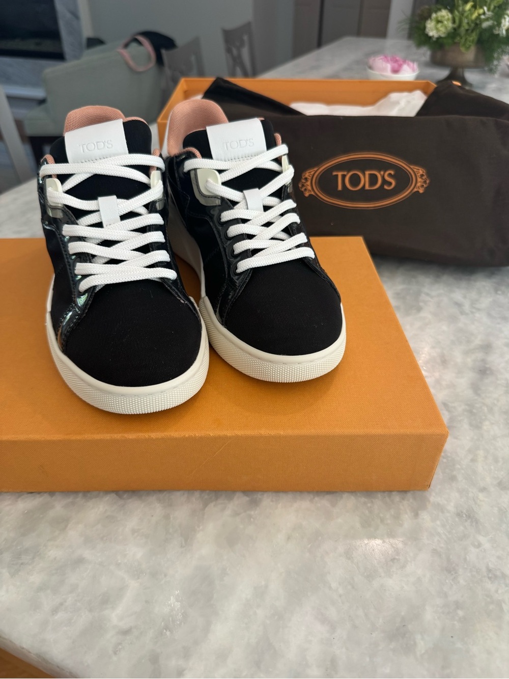 Tod's Women’s Black Pink Mesh & Leather
Low-Top Platform Italian luxury sneakers